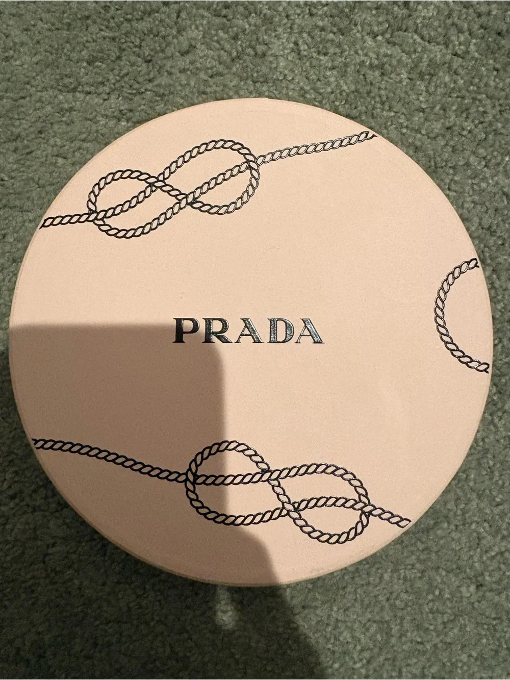 Prada Pink Round Box with Black Rope Motif